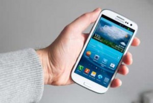 
Galaxy smartphone in hand.