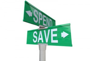 
Sign post pointing to spend and save.